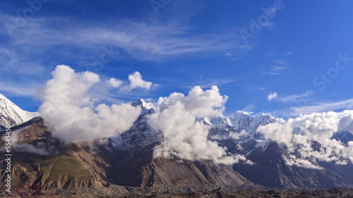 Clouds over glacier Inylchek. Kirgystan, central Tien Shan photo