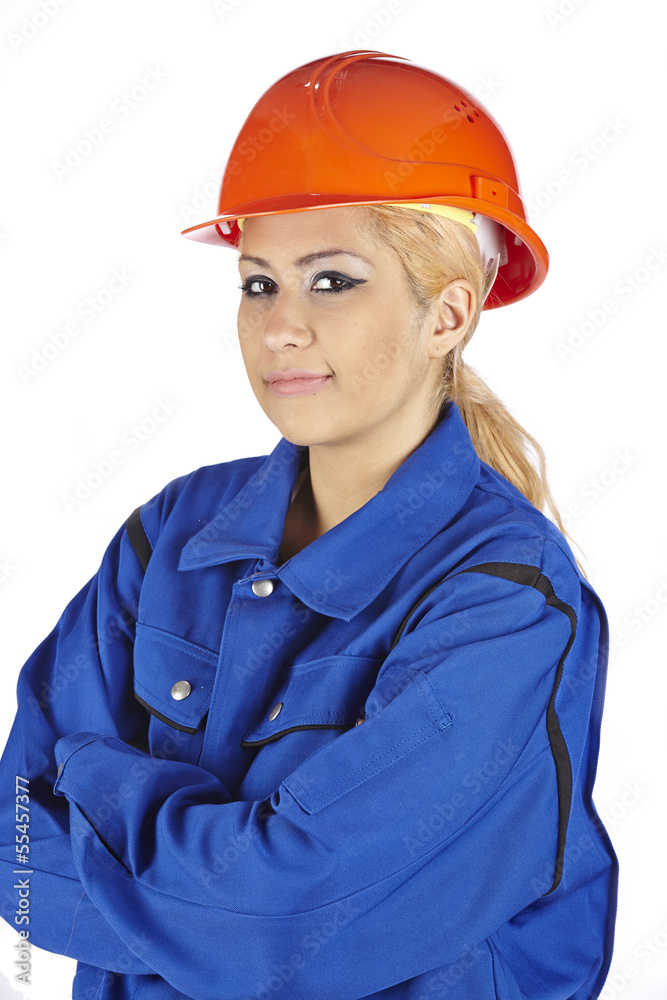 Fröhliche Handwerkerin mit Blaumann und rotem Bauhelm Fröhliche Handwerkerin mit Blaumann und rotem Bauhelm