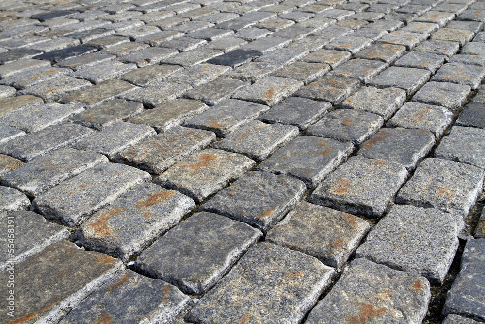 cobblestone background in oblique perspective cobblestone background in oblique perspective