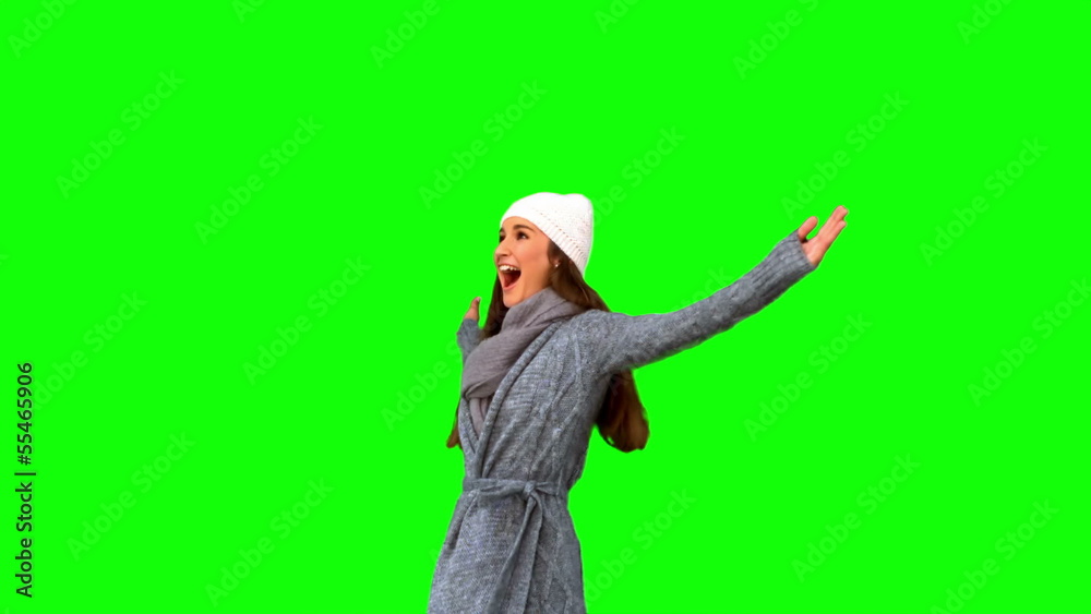 Smiling young woman cheering