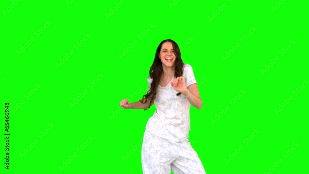 Energetic young model in pyjamas dancing Energetic young model in pyjamas dancing