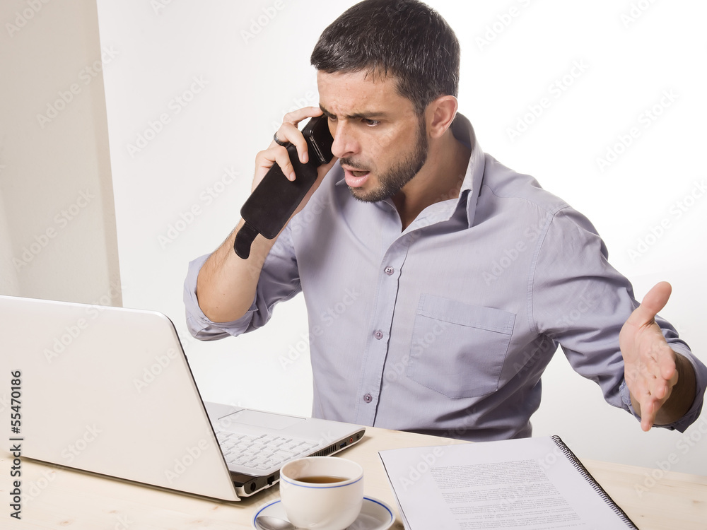 Young Man with Beard working on Laptop Young Man with Beard working on Laptop