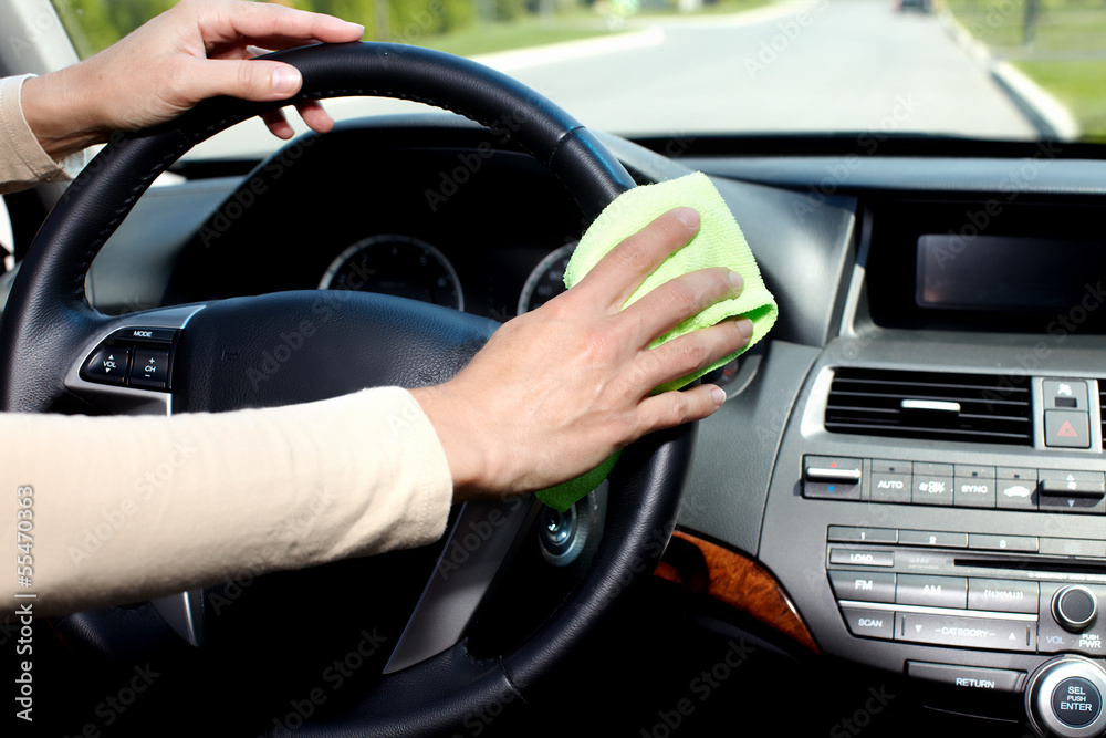 Hand cleaning car.