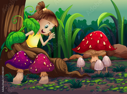 A young girl near the roots of the giant tree
