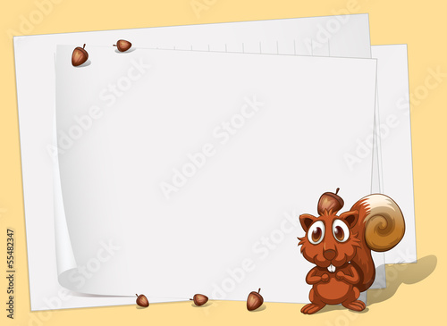 A squirrel in front of the empty papers