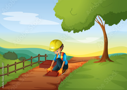 An engineer fixing the road
