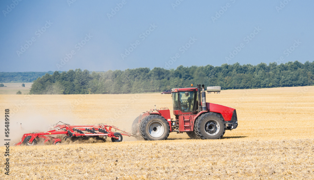 Fototapeta premium Color photo of a red tractor
