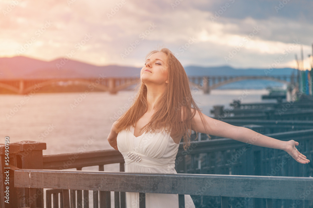 Free happy young woman enjoying nature. Beauty girl outdoor. Free happy young woman enjoying nature. Beauty girl outdoor.