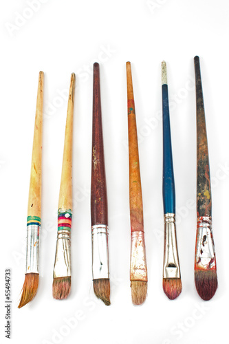 Used artist brushes isolated on white