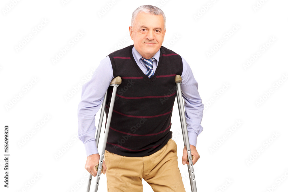 Happy gentleman walking with crutches Happy gentleman walking with crutches