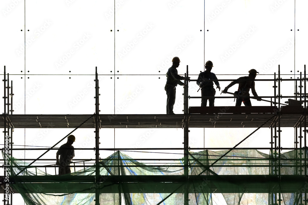 Construction worker silhouette at work