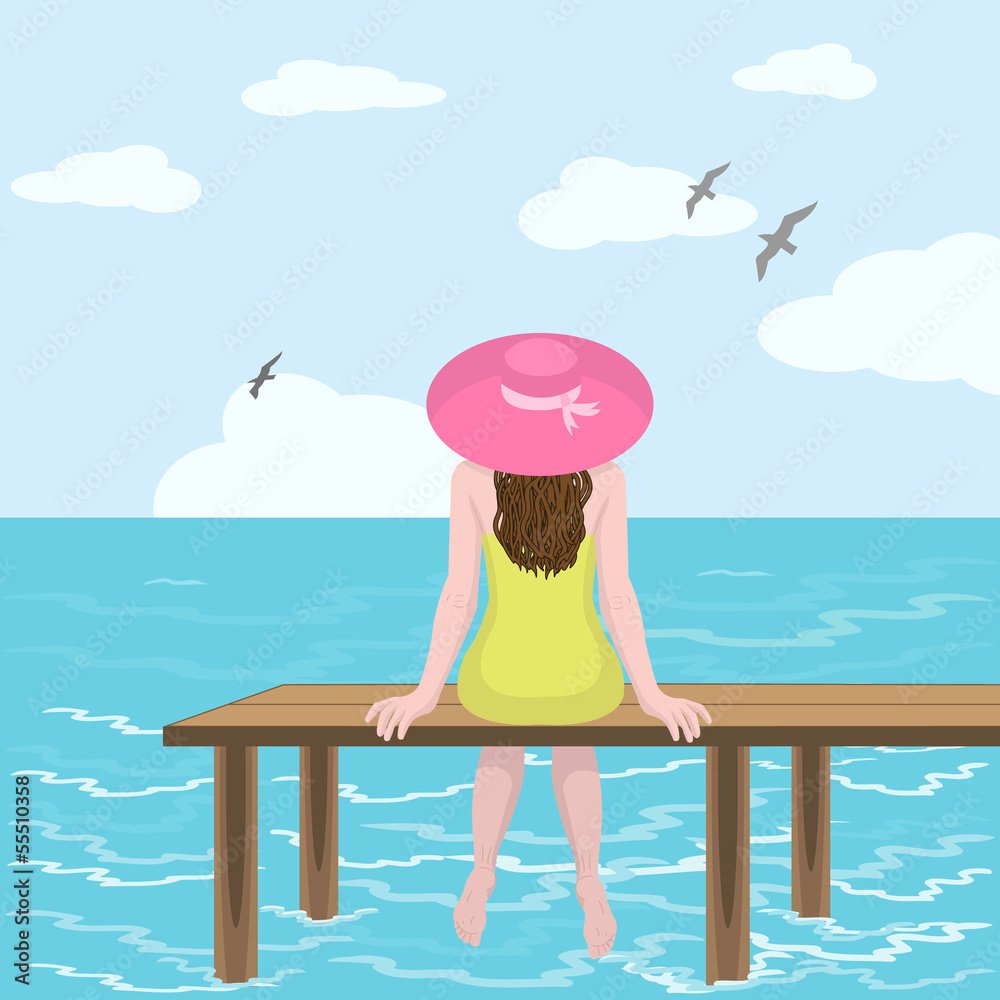 Girl in hat and sea
