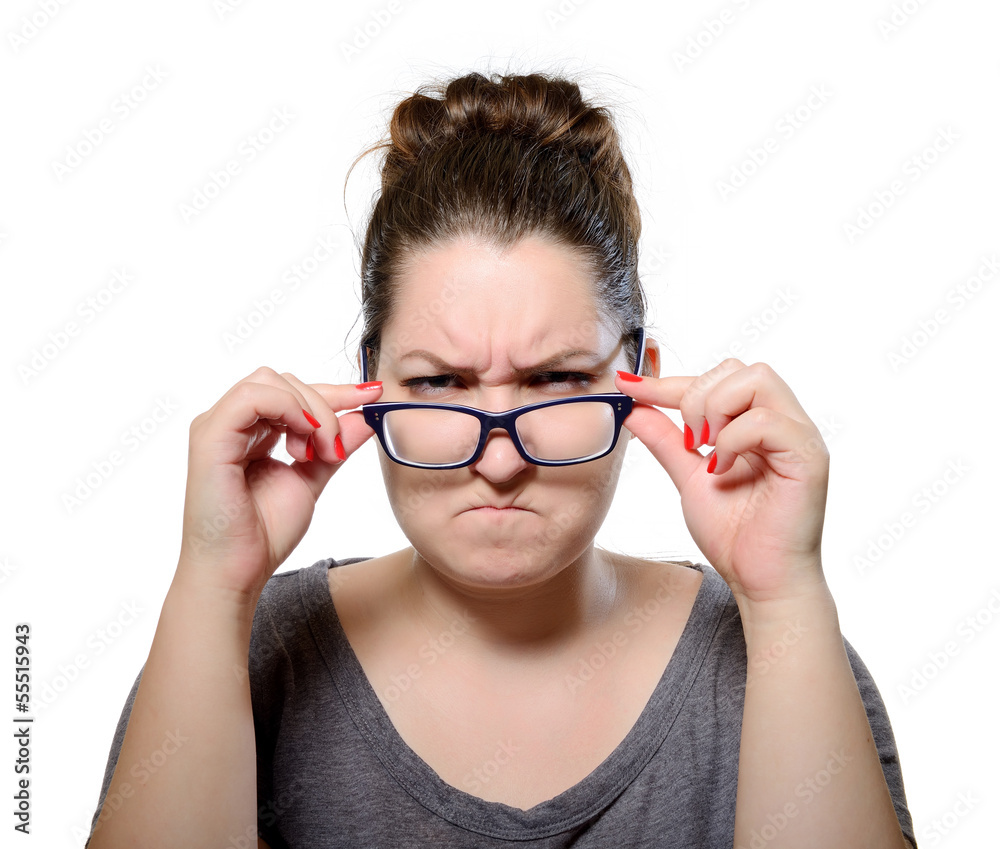 Angry strict woman wears glasses, grimace portrait