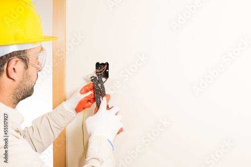 Performing a repair electrician photo