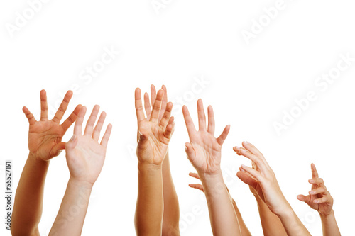 Many desperate hands reaching up photo