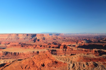 Fotobehang Natuurpark Canyonlands park bij zonsondergang  © Tupungato