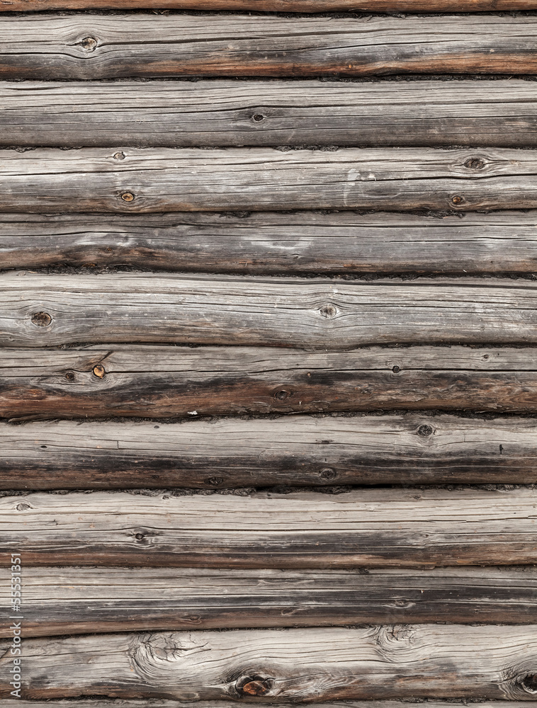Wooden wall of rural house made of logs Wooden wall of rural house made of logs