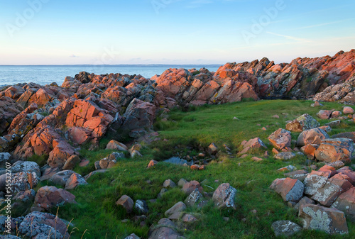 Swedish rocky coast at the sunset photo