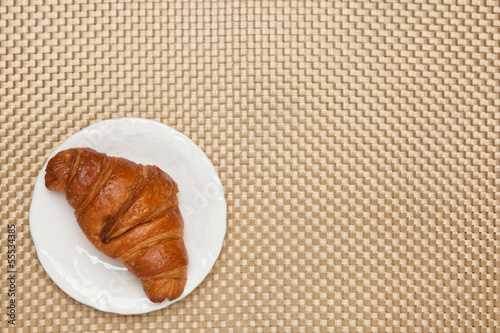 croissant on the table cloth