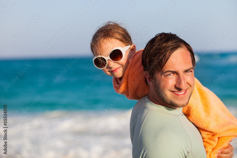 Father and daughter at beach