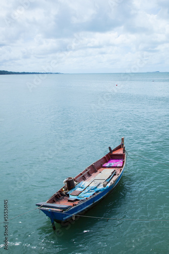 Fishing boats moored at sea. © vachiraphan