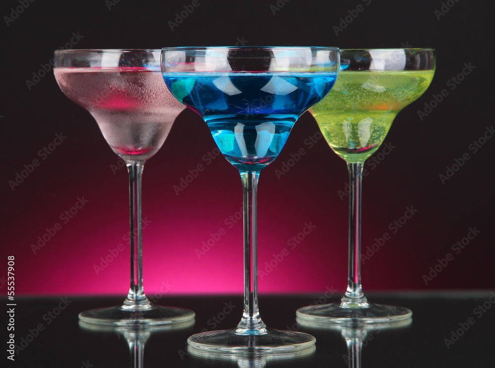 Obraz premium Cocktails on dark color background