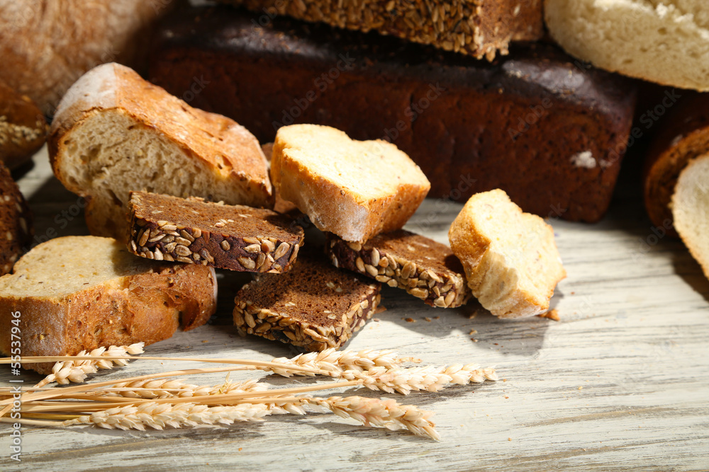 Much bread on wooden board Much bread on wooden board
