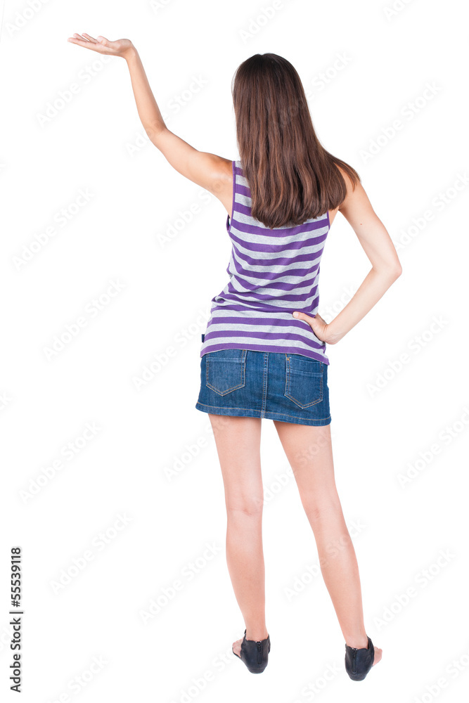 back view of surprised beautiful brunette young woman back view of surprised beautiful brunette young woman