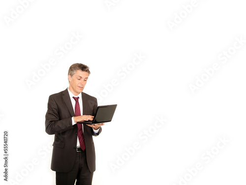 Geschäftsmann mit Laptop © Peter Atkins