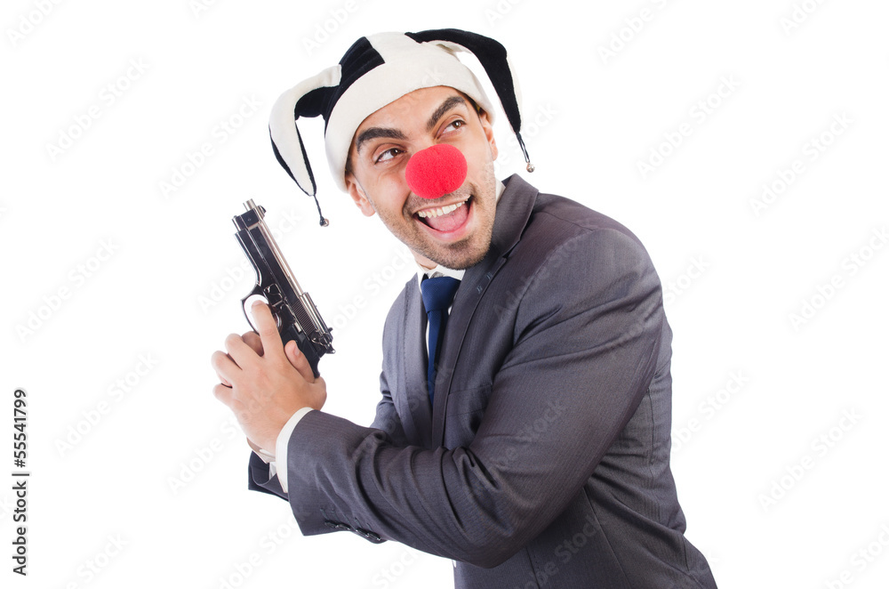 Businessman clown with gun isolated on white Businessman clown with gun isolated on white