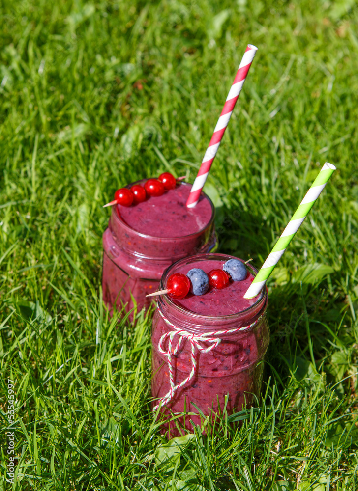 Fresh smoothie drink with different berries as healthy breakfast Fresh smoothie drink with different berries as healthy breakfast
