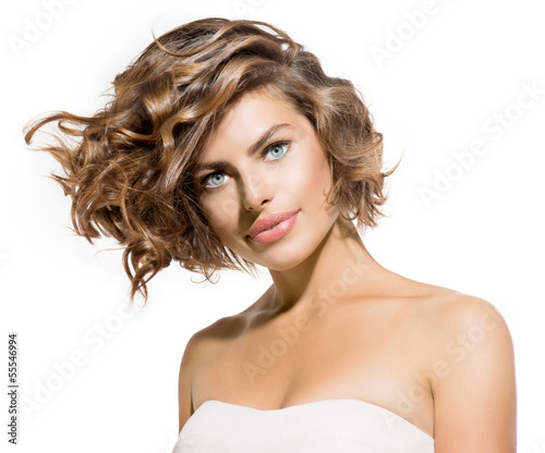 Beauty Young Woman Portrait over White. Short Curly Hair