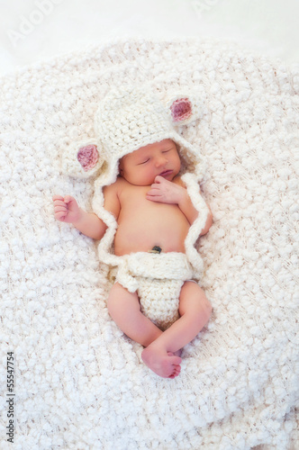 Newborn Baby Wearing a Lamb Costume