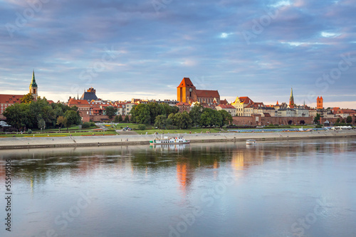 Torun old town reflected in Vistula river, Poland