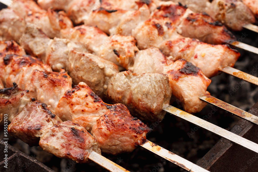 Juicy Slices Of Meat With Sauce Prepare On Fire (Shish Kebab, Sh