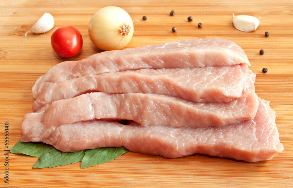 Raw pork with spices and vegetables