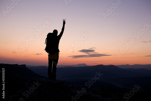 man show concept of success on top of mountains