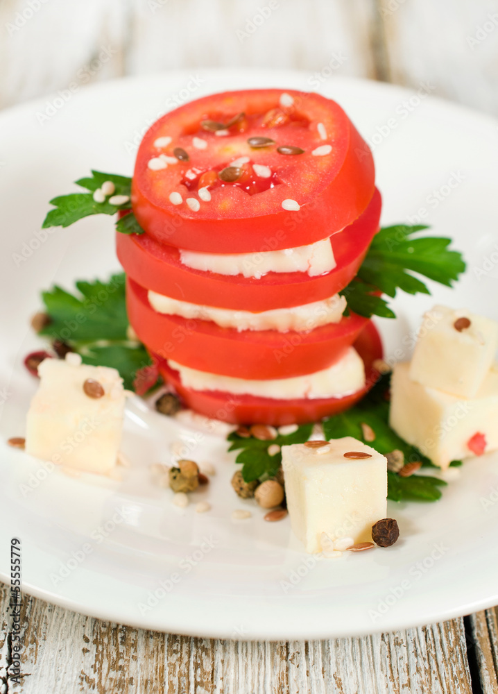 dish of tomato, feta and parsley dish of tomato, feta and parsley