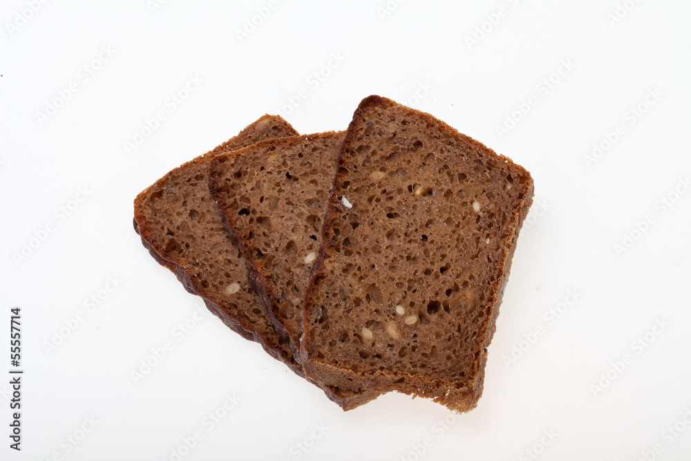 Slices of dark bread isolated over white Slices of dark bread isolated over white