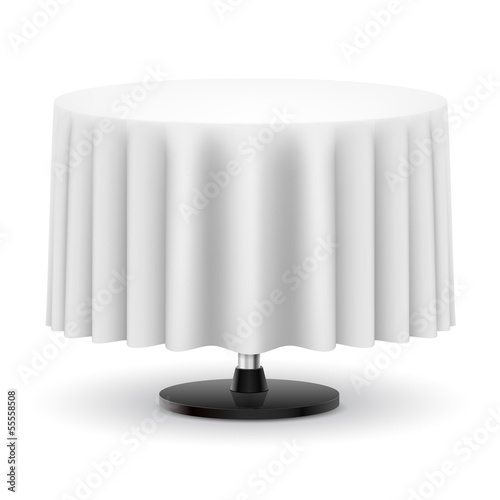 Round table with white cloth.