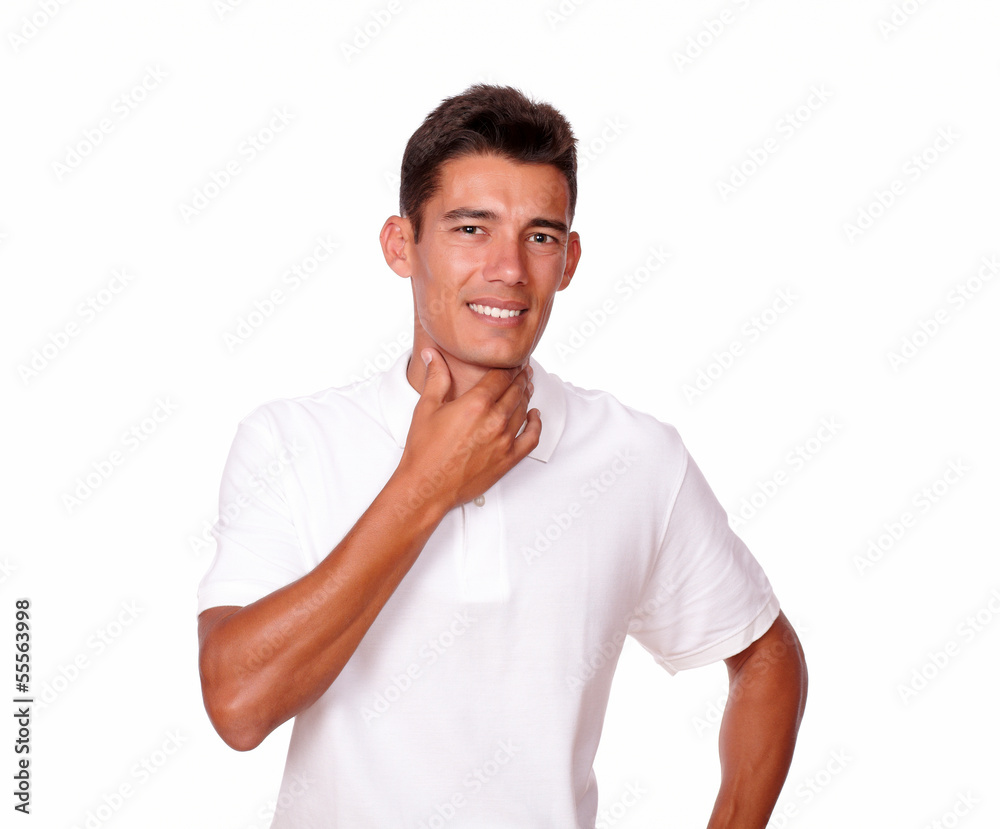 Young man looking sick with hands on throat. Young man looking sick with hands on throat.
