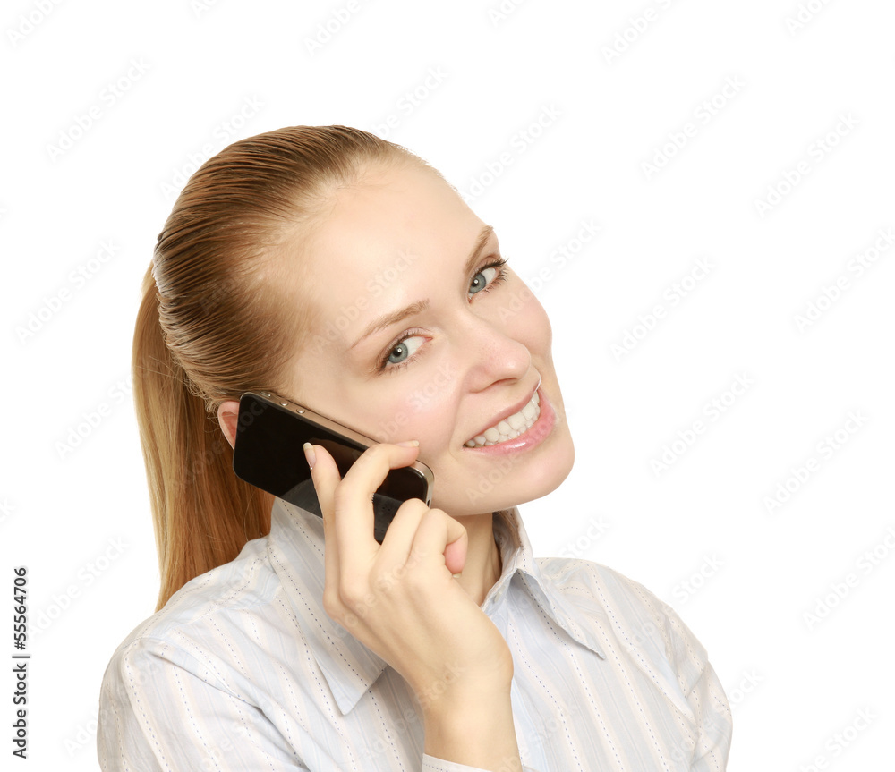 A young successful businesswoman talking on the phone A young successful businesswoman talking on the phone