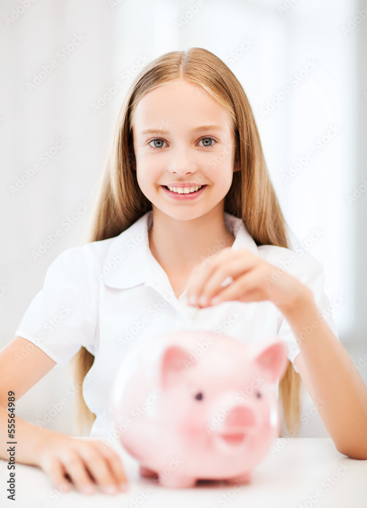 child with piggy bank child with piggy bank
