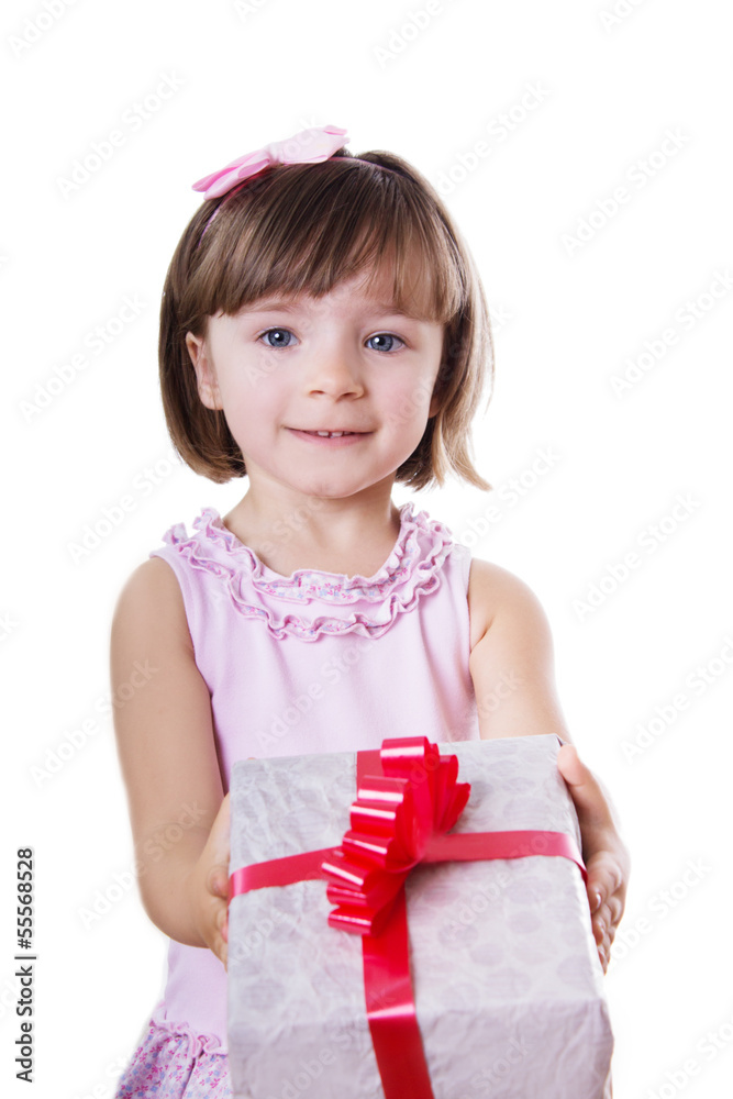 Smiling little girl holding present box Smiling little girl holding present box