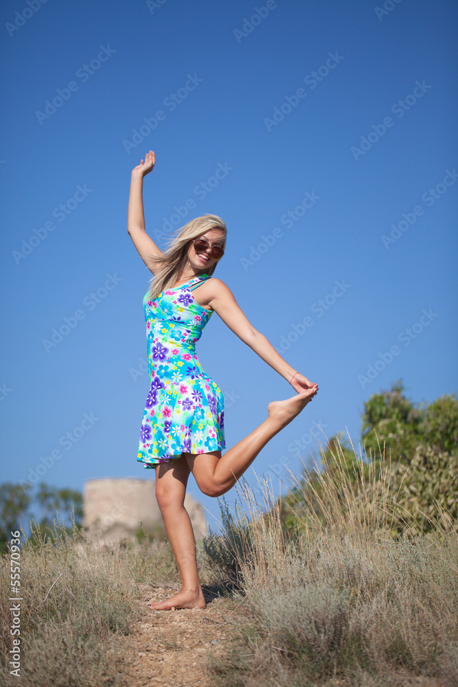 Beautiful young woman wearing bright dress Beautiful young woman wearing bright dress