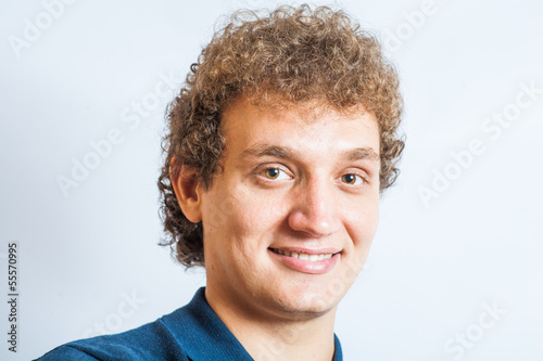 Bild auf Leinwand Smiling handsome young man. Nice guy smiling