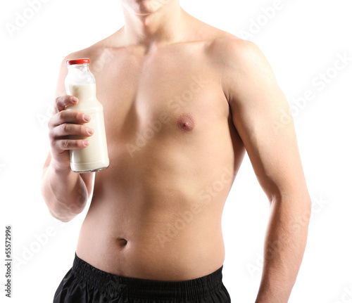 Handsome young muscular sportsman with protein drink, isolated