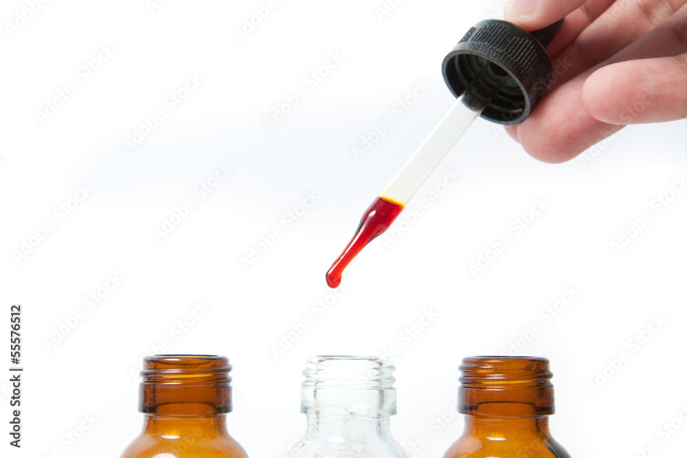 Red liquid from dropper Red liquid from dropper