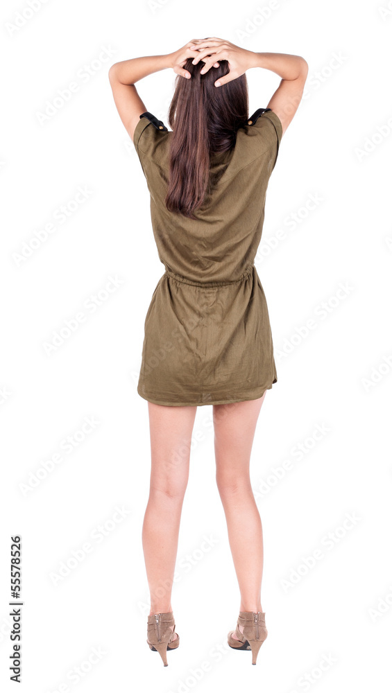 back view of standing young beautiful brunette woman. back view of standing young beautiful brunette woman.