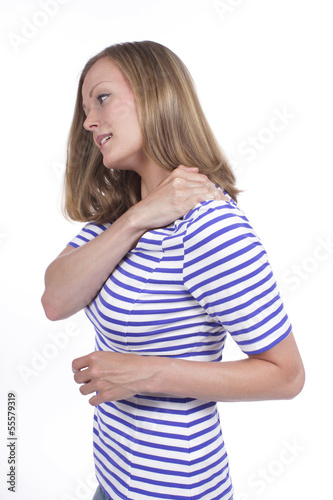 Frau mit Schulterschmerzen - woman with shoulder pain photo
